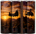 Four sides of a tumbler cup with clear lid, wrapped in a wrap-around print featuring a military helicopter flying over a desert landscape at sunset. The cup is arranged in a row, showing the wrap design from different angles.